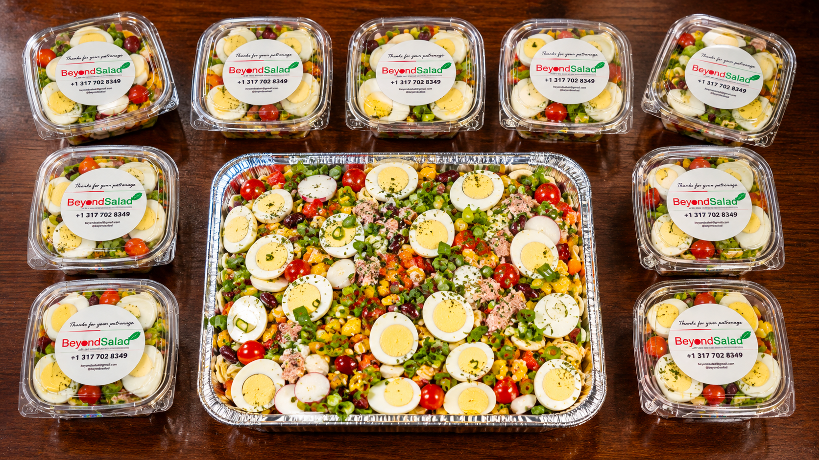 A Beyond Salad tray with a lineup of branded salad bowls