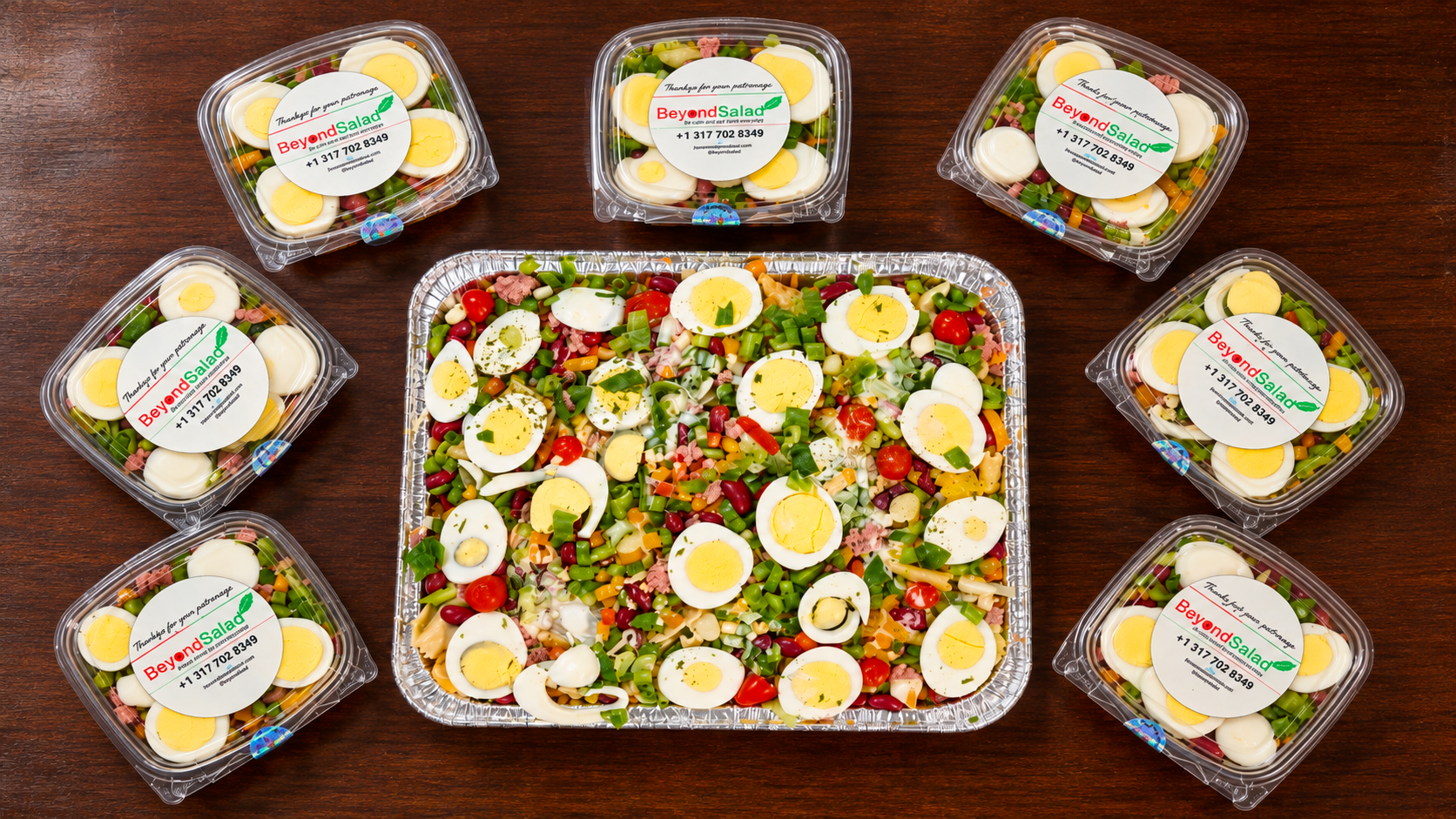 Beyond Salad salads and homemade Moi Moi arranged for an order