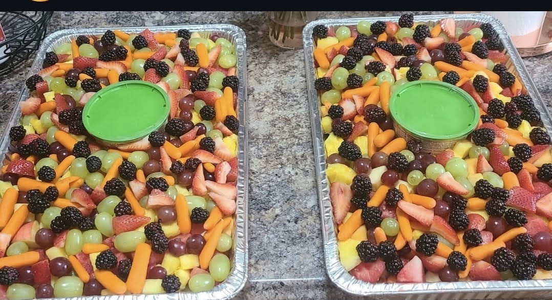 Beyond Salad full fruit trays with strawberries, grapes, blackberries and pineapple